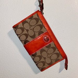 Coral leather Coach wristlet